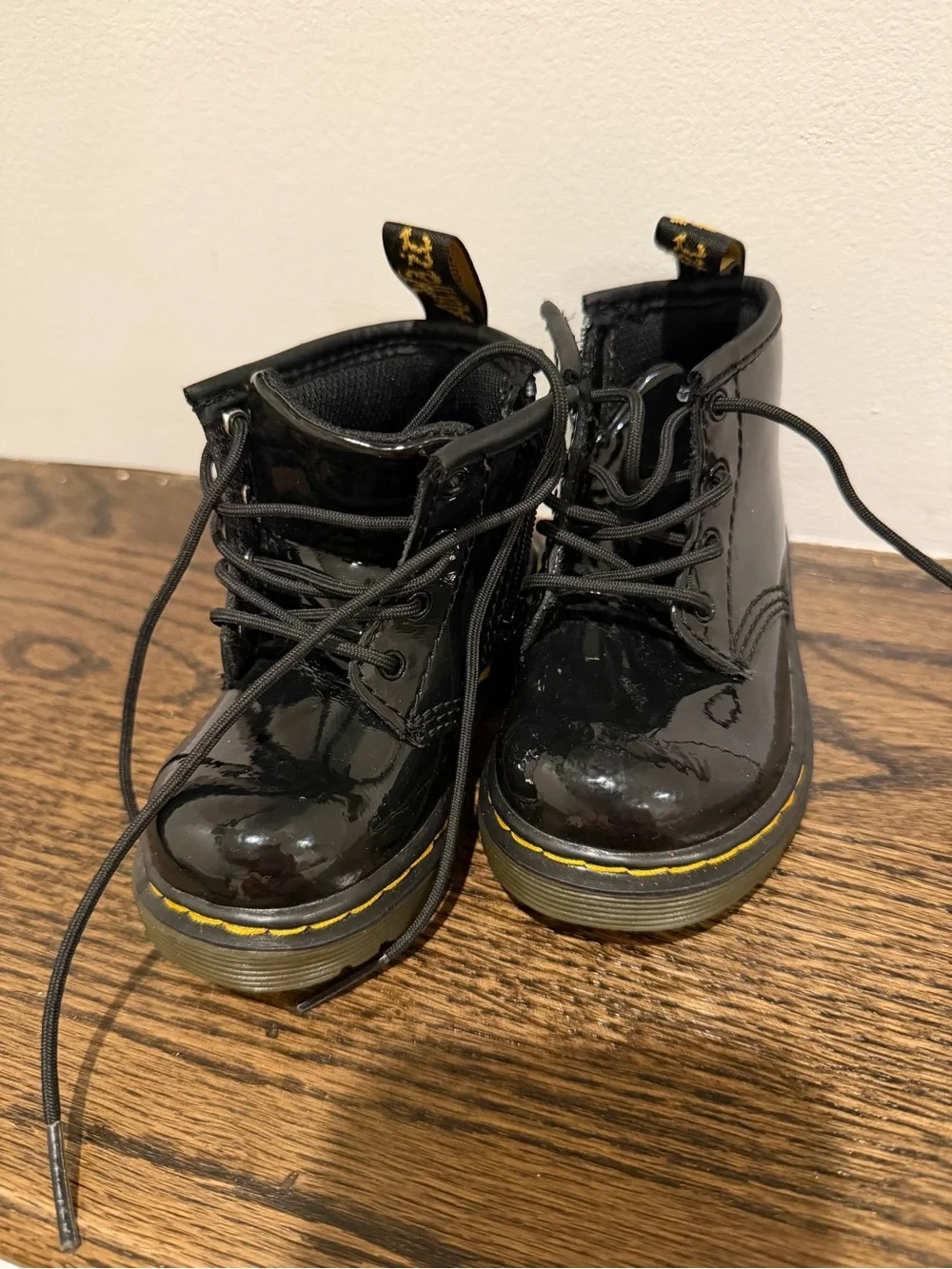 Dr. Martens Kids Black Patent Lace-Up Boots with Yellow Welt